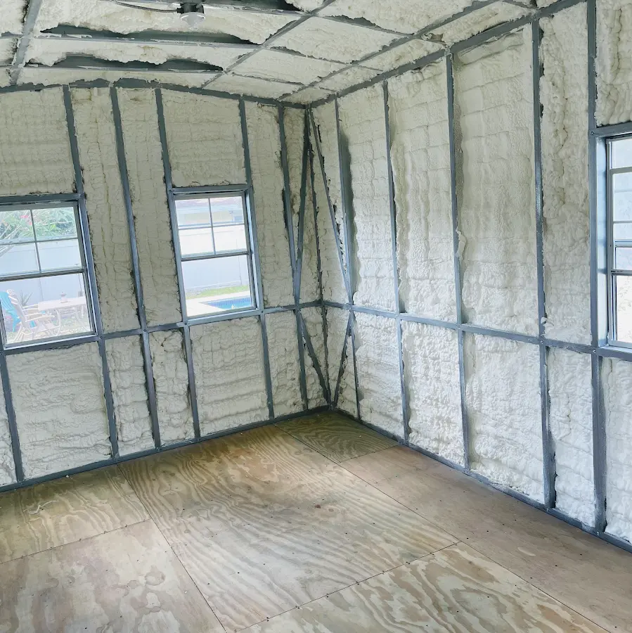 Closed-cell spray foam insulation applied to wall cavities in a residential project in Suncrest